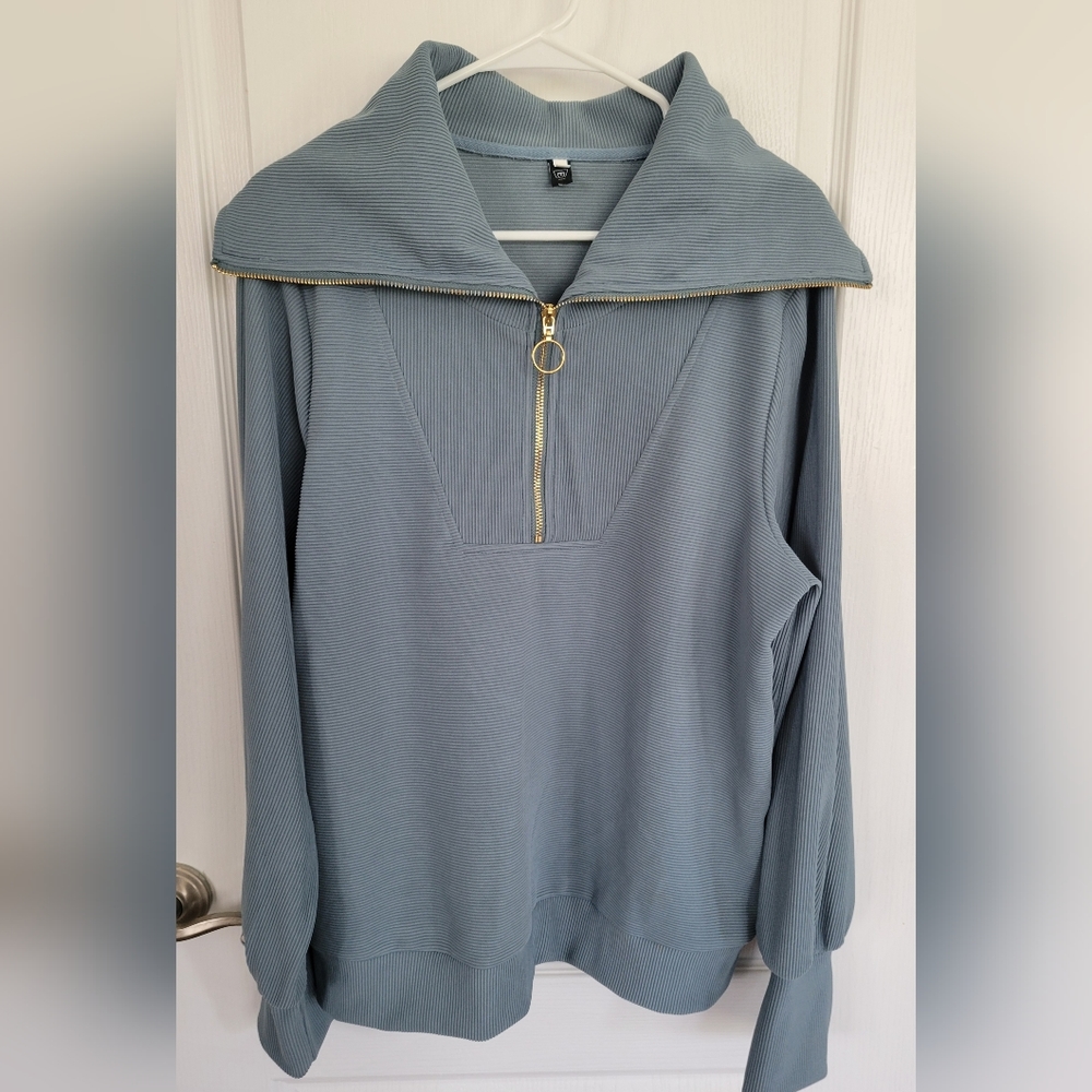 3/4 zip pullover. Beautiful blue/ green/ gray color.